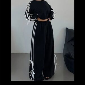 Amazon Black Joggers with White Stripes and Bow Accents